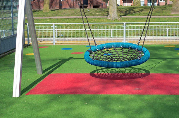Soft synthetic grass for safe play areas