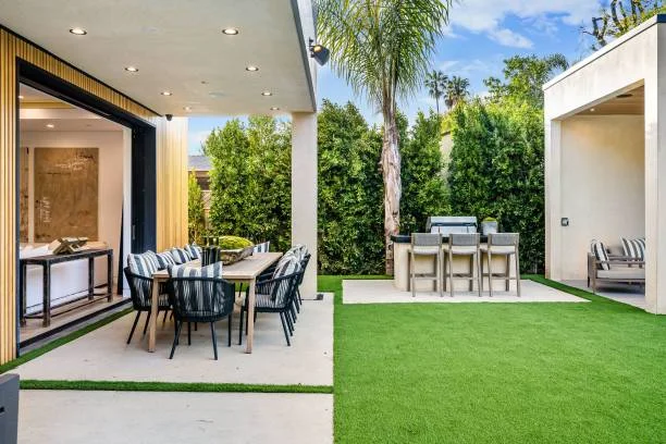Sustainable artificial grass for patio spaces